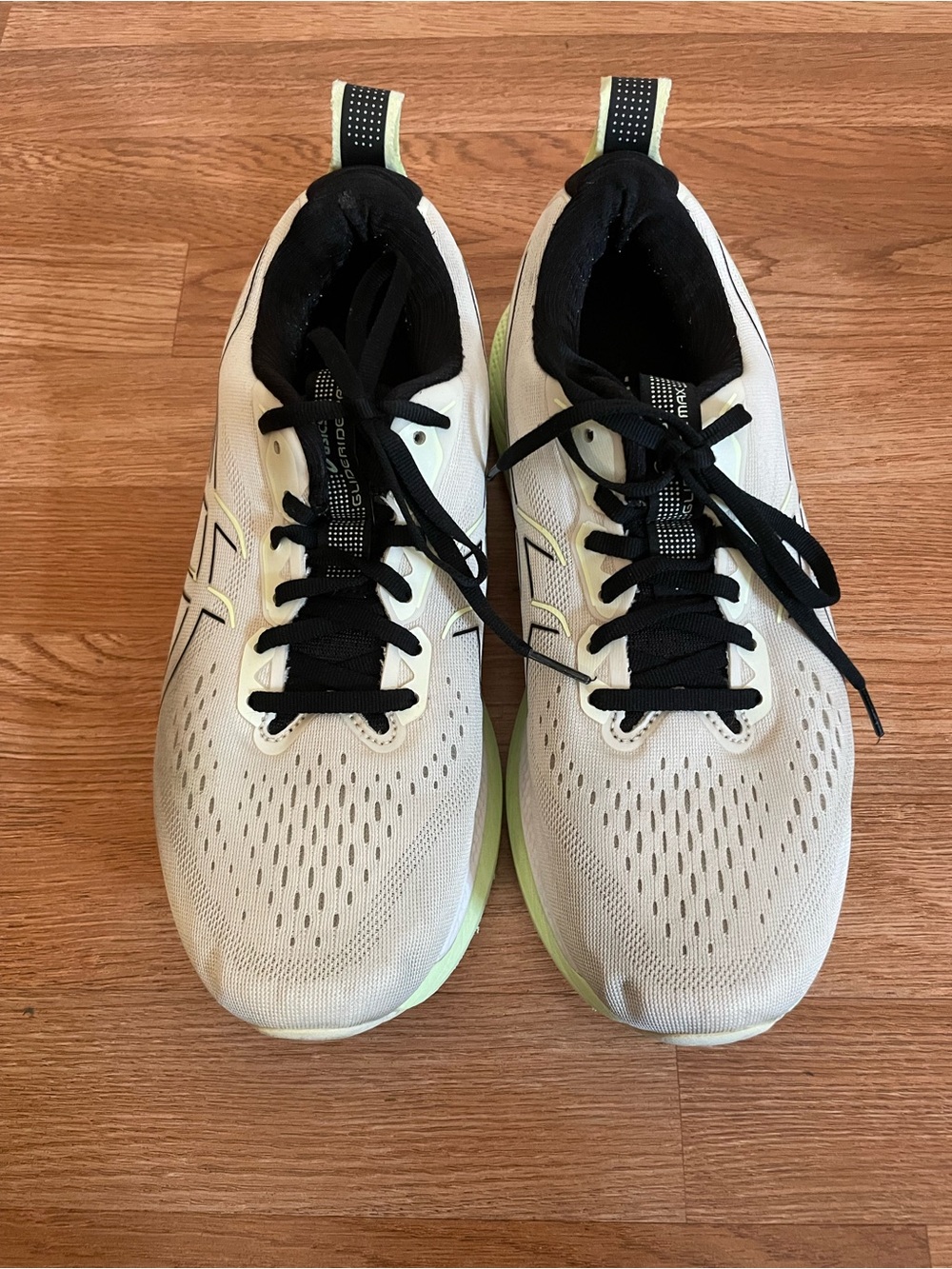 Asics White and Black Running Shoes with Pale Green Sole Accents